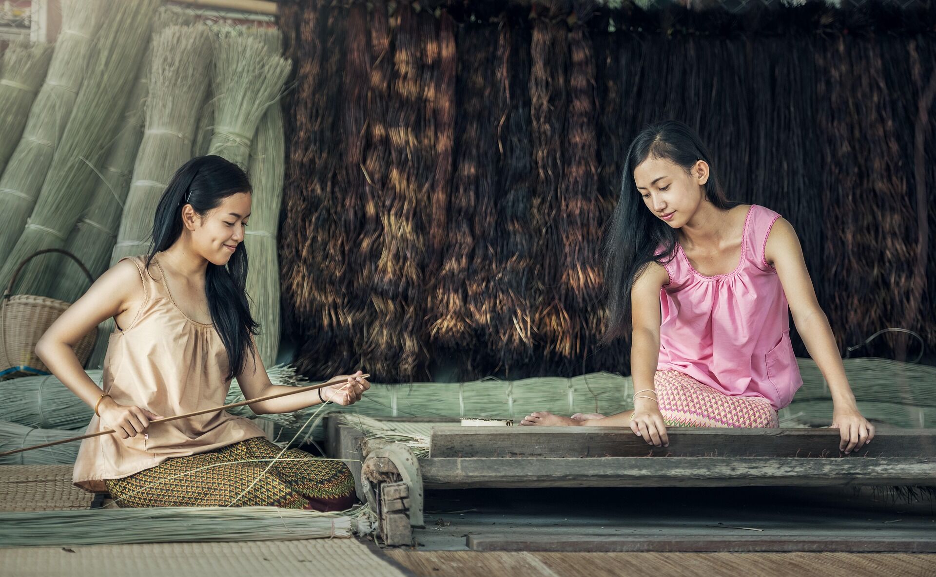 Local Girls Weaving in Laos